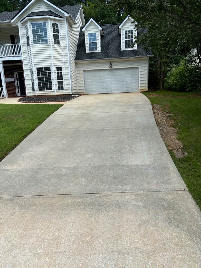 Driveway after pressure washing